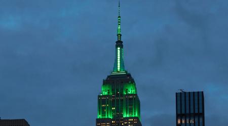 The Empire State Building lit up green